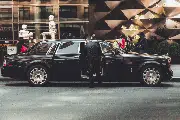 Business passenger traveling in a luxury vehicle