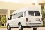 Classic 15 Passenger Shuttle Van photo 2